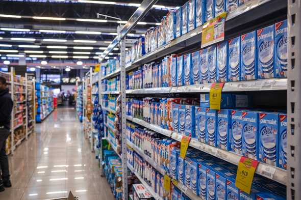 Milk Shelves: Lotsa leche in little boxes