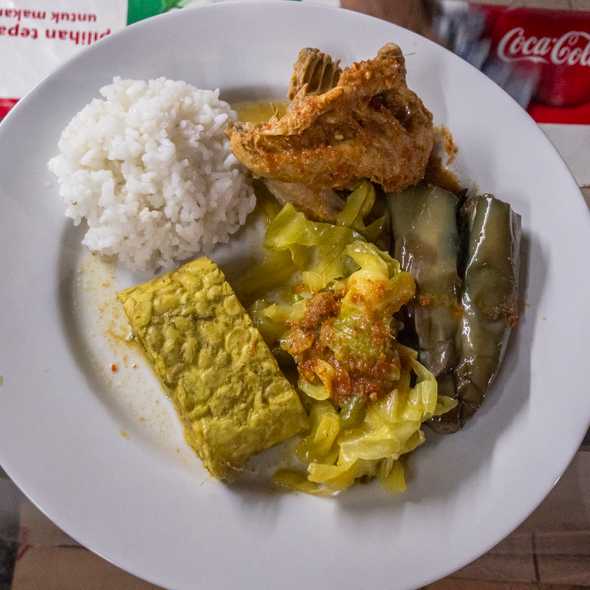 Rice, chicken, eggplant, braised cabbage, tempeh.