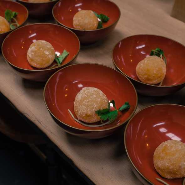 Stuffed potato dumplings to be served in a dashi broth.