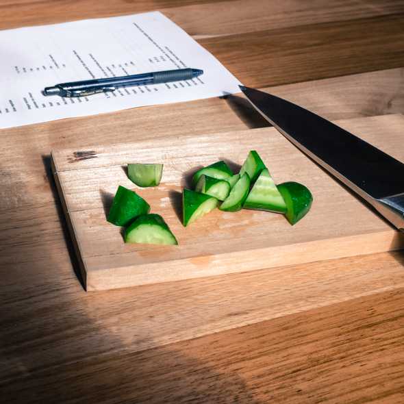 Cutting vegetables so that they have the maximum surface area for pickling.